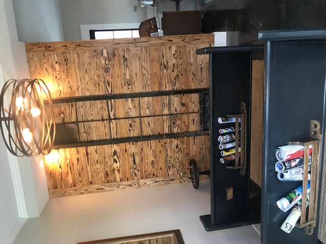 A light fixture over bench seating in a waiting area