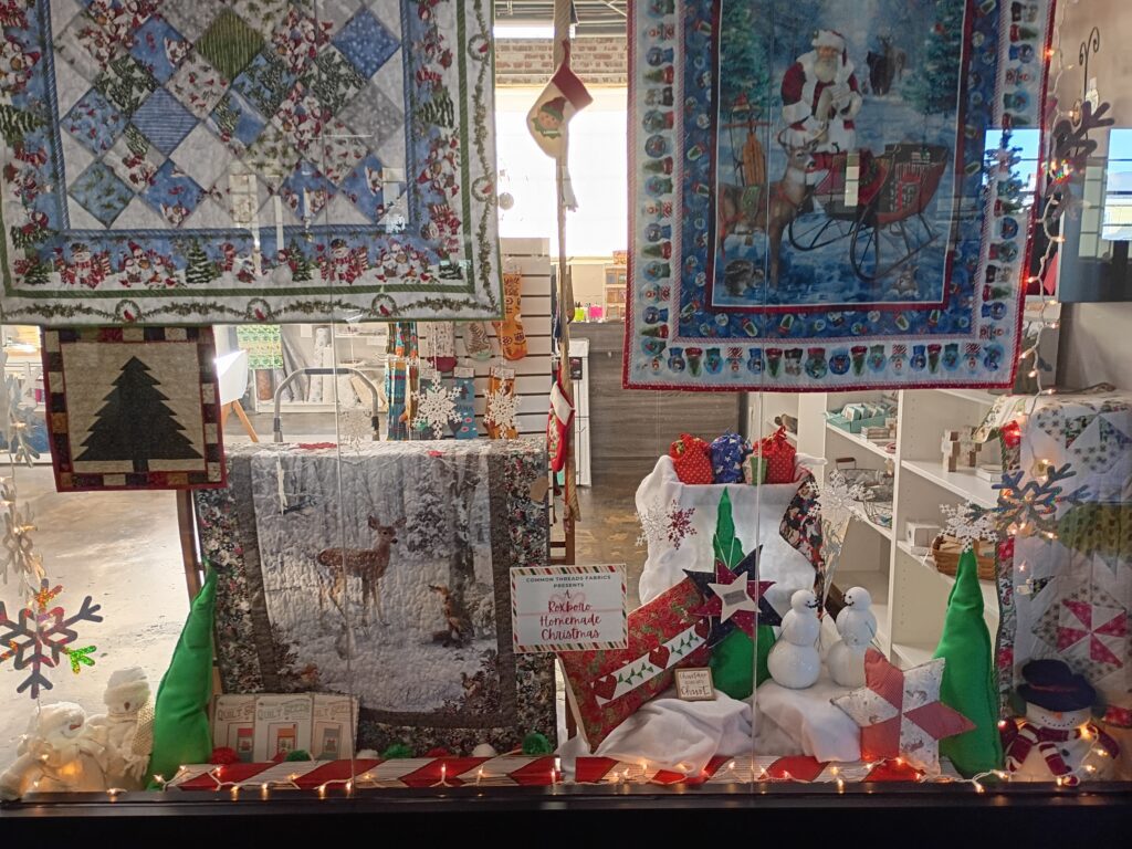 Common Threads holiday window display